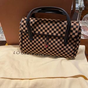 Rear LV Gazelle hair. Leather trim